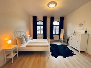 1 bedroom, desk, iron/ironing board, travel cot