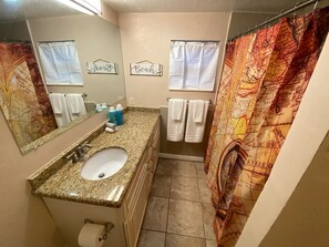 Hair dryer, towels, soap, shampoo