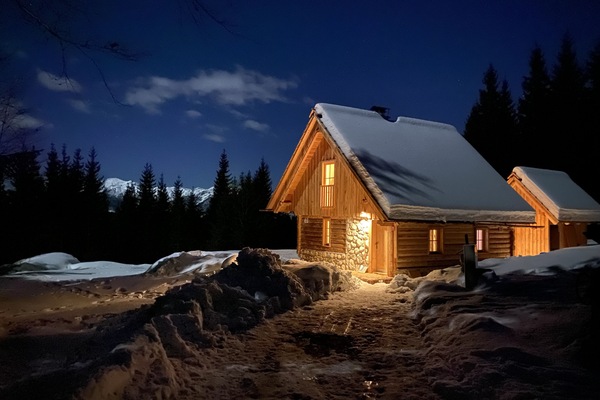 Property in winter with fool moon