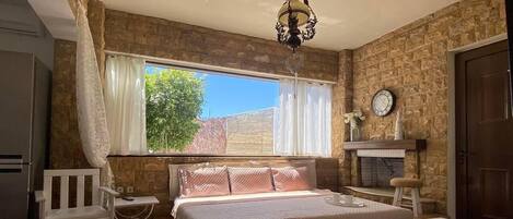 Appartamento, 2 letti queen | 2 camere, ferro/asse da stiro, Wi-Fi gratuito, lenzuola