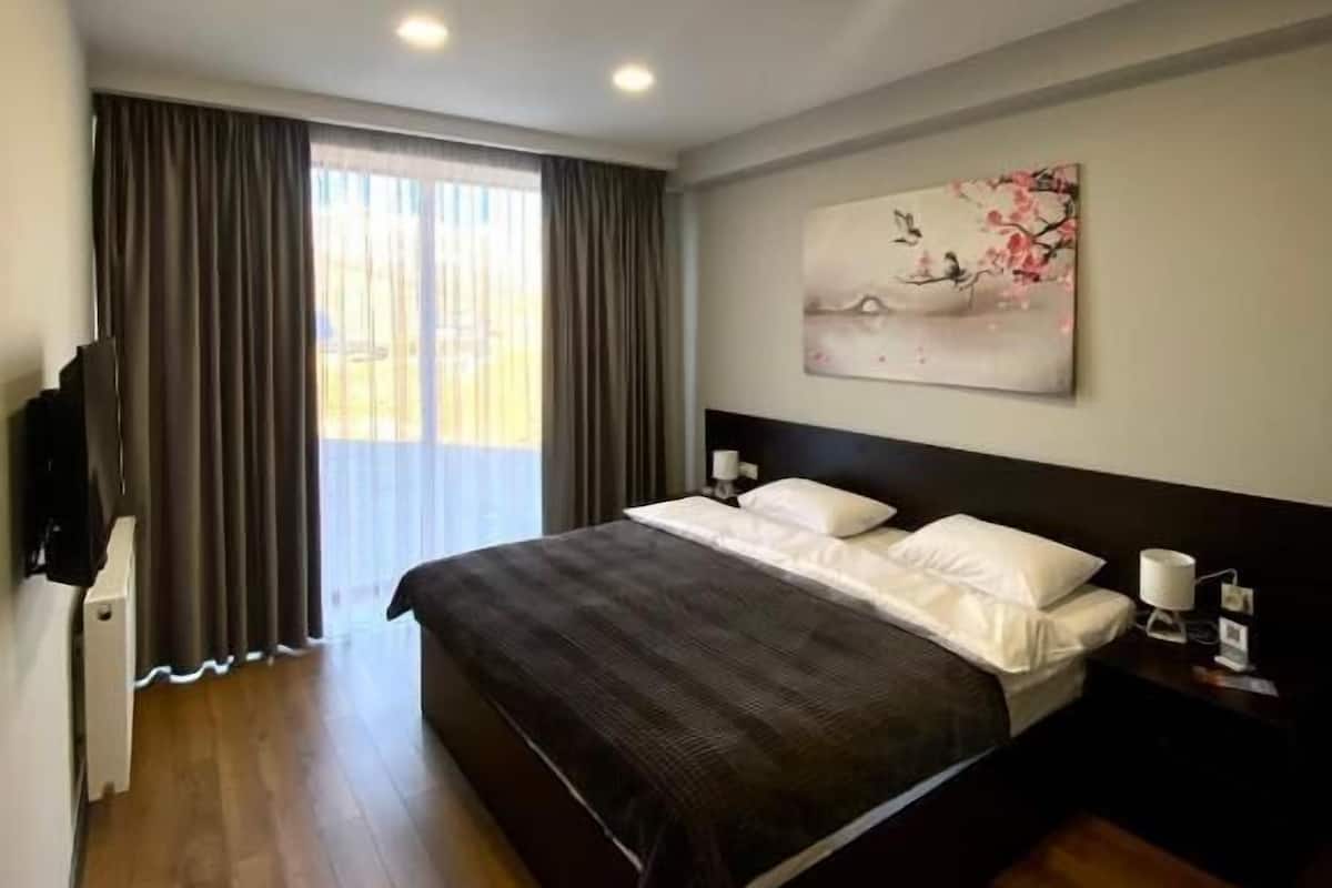Blackout drapes, soundproofing, iron/ironing board, WiFi (free)
