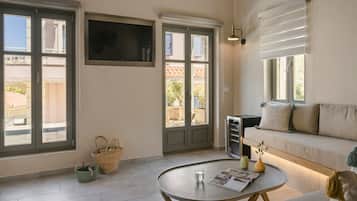 Special Offer Villa With Plunge Pool | Área de sala de estar | Smart TV de 40 pulgadas con canales por cable, televisión y Netflix