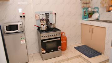 Apartment | Private kitchen | Fridge, microwave, oven, stovetop