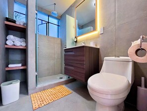Shower, eco-friendly toiletries, hair dryer, towels