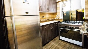 Apartment | Private kitchen - Yellow & Brown Moderne Style Near Food-court (Cairo)