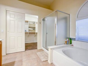 Bathtub, hair dryer, towels