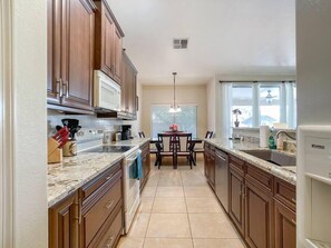 Fridge, microwave, oven, stovetop - Single-Story home in Chandler-Entire House (Chandler)