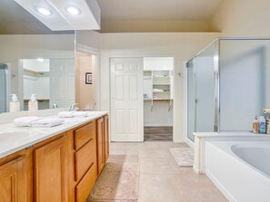 Bathtub, hair dryer, towels