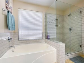 Bathtub, hair dryer, towels