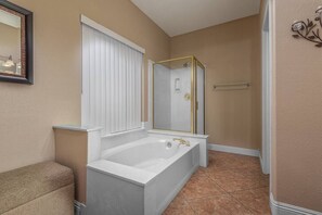 Bathtub, hair dryer, towels