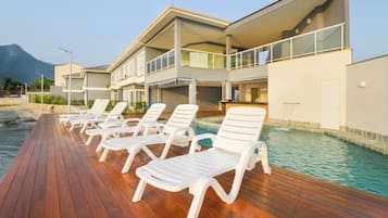 Outdoor pool, open 8:00 AM to 10:00 PM, pool loungers