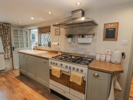 Fridge, electric kettle, toaster, cookware/dishes/utensils