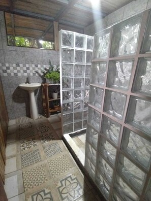 Shower, towels, soap, toilet paper