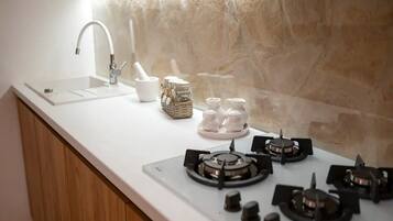 House (Three Bedroom Holiday Home with Swimm) | Private kitchen | Fridge, dining tables