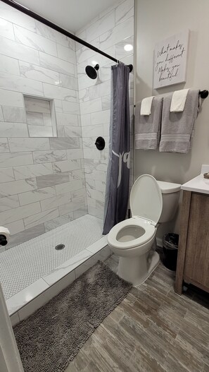 Hair dryer, towels, soap, shampoo