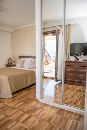 1 bedroom, desk, iron/ironing board, travel cot