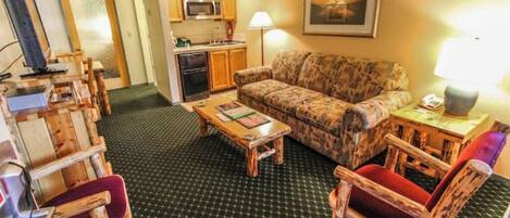 Televisio, DVD-soitin, kirjoja, videokirjasto