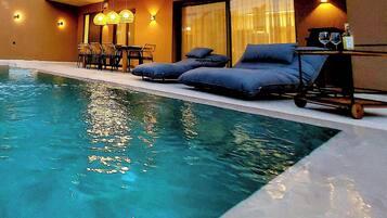 2 outdoor pools, pool umbrellas, pool loungers