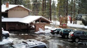 Guests can enjoy a covered porch area at this lodge.
