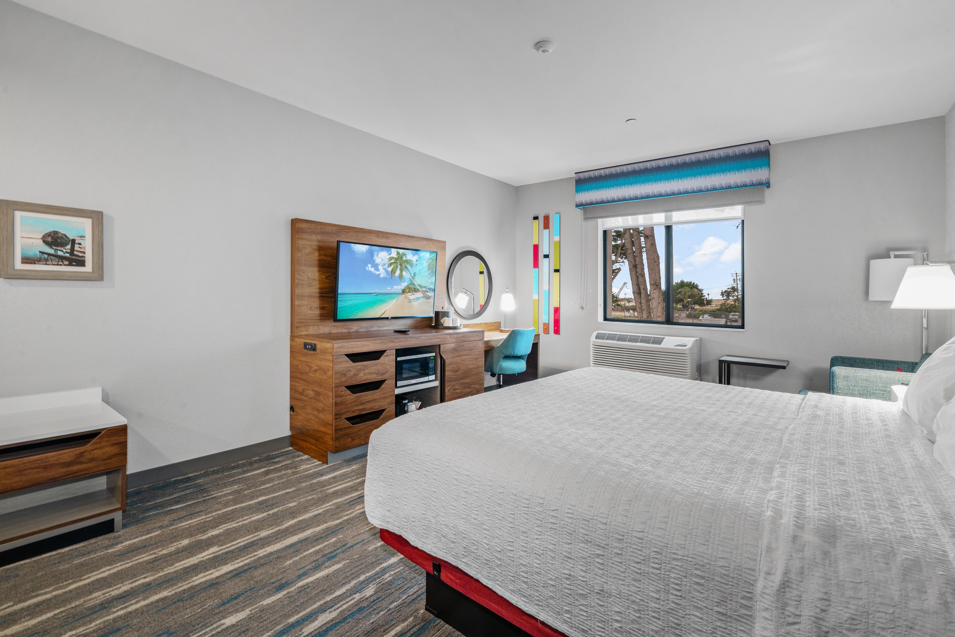 Desk, laptop workspace, blackout drapes, iron/ironing board