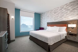 Desk, laptop workspace, blackout drapes, iron/ironing board