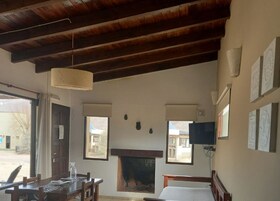 Cabaña familiar | Zona de estar | Una chimenea