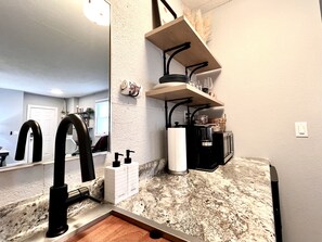 Microwave, coffee/tea maker, cookware/dishes/utensils