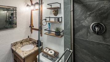 Shower, hair dryer, towels, soap