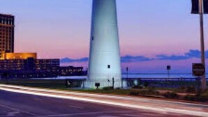 A lighthouse with a clear sky and a sunset. - Relax in the Countryside: Enjoy a Vacation in a 3 Bedroom Farm House! (Lucedale)