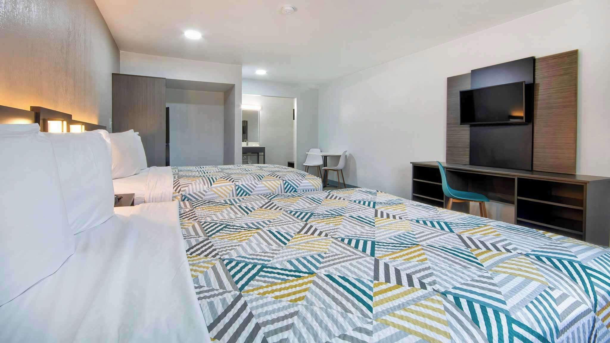 Desk, laptop workspace, free WiFi, bed sheets