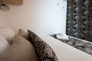 1 chambre, fer et planche à repasser, Wi-Fi gratuit, draps fournis