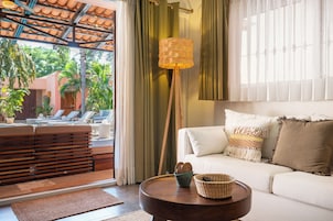 Orchid Suite | Living area | 40-inch Smart TV with digital channels, TV, Netflix