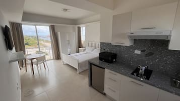 1 bedroom, premium bedding, down comforters, laptop workspace