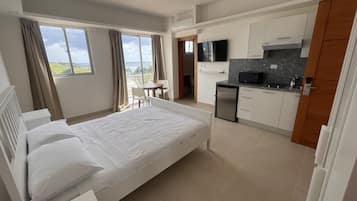 Premium bedding, down duvets, laptop workspace, blackout curtains