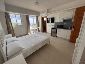 Premium bedding, down duvets, laptop workspace, blackout curtains