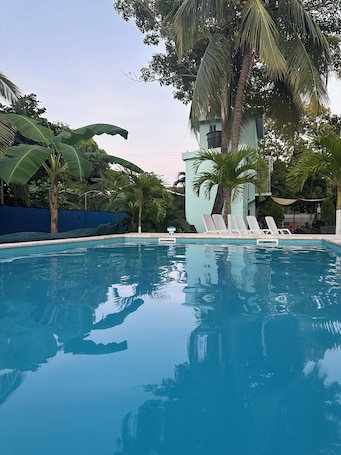 Outdoor pool. this place will bring lots of peace to enjoy the sun and the beach!