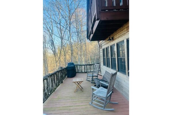 The deck has 2 rocking chairs, an antique glider, gas grill, and a clawfoot tub!