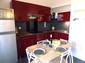 Fridge, toaster, cookware/dishes/utensils