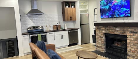 Smart TV, fireplace, books