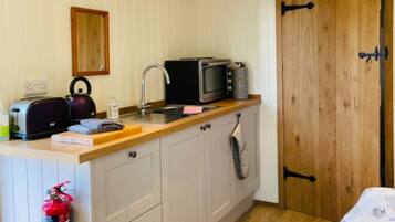 Microwave, stovetop, toaster, cookware/dishes/utensils