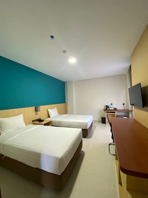 Habitación superior con 2 camas individuales | Wifi gratis y ropa de cama