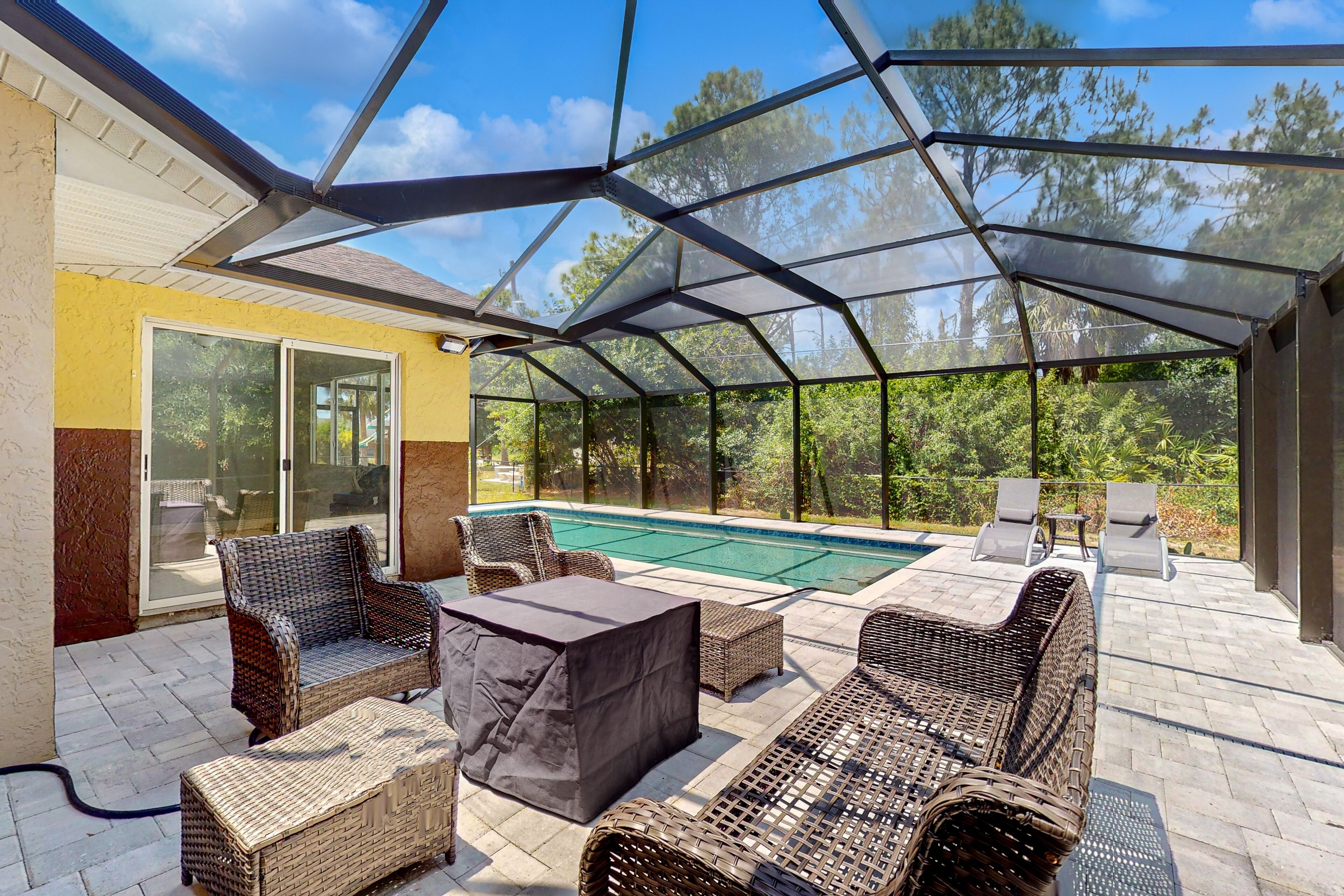 Updated home with large fenced yard, grill, patio & new interior - dog-friendly