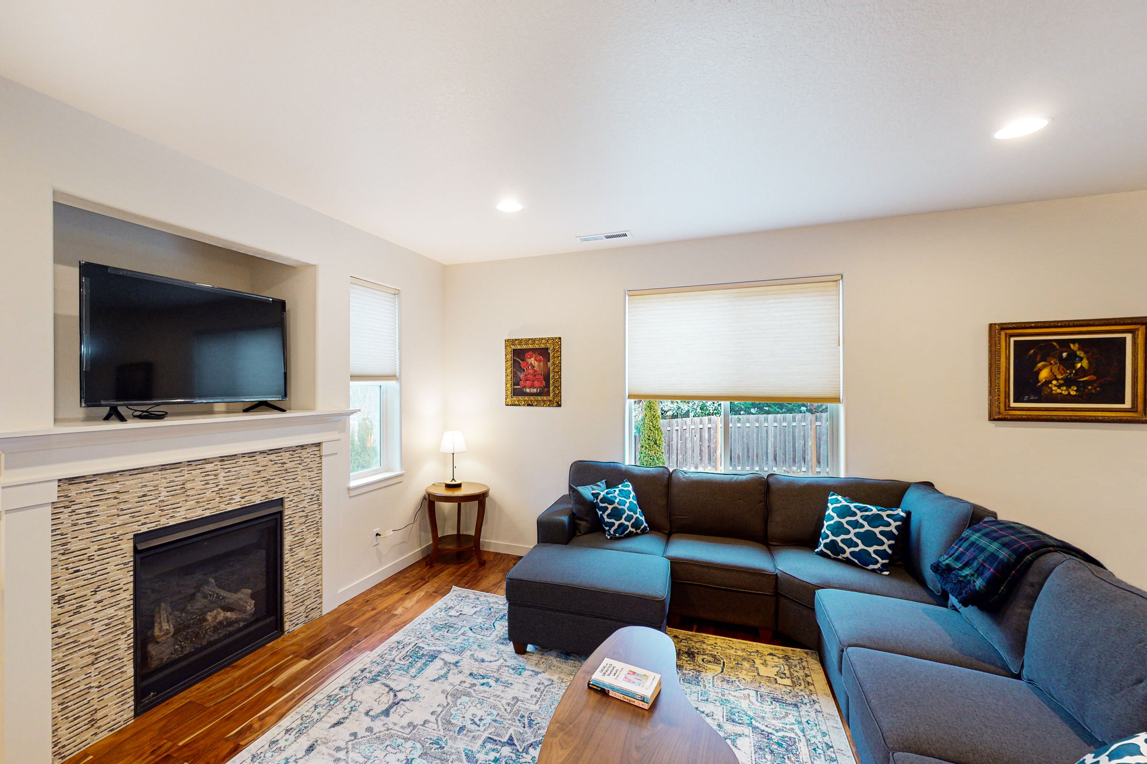 Charming dog-friendly home with fireplace, workspace, patio, W/D, & AC