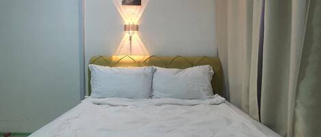 Huone, jaettu kylpyhuone | Vuodevaatteet