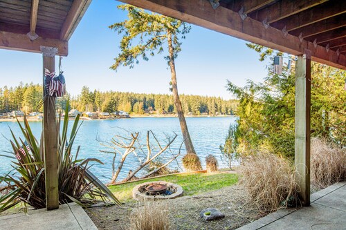 Waterfront, dog-friendly home with private beach, amazing deck & harbor view