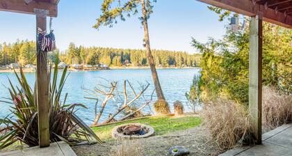 Waterfront, dog-friendly home with private beach, amazing deck & harbor view