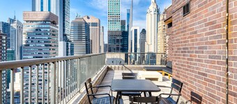 Luxe Midtown East 5BR w/ W/D & Balconies, nr Central Park, by Blueground