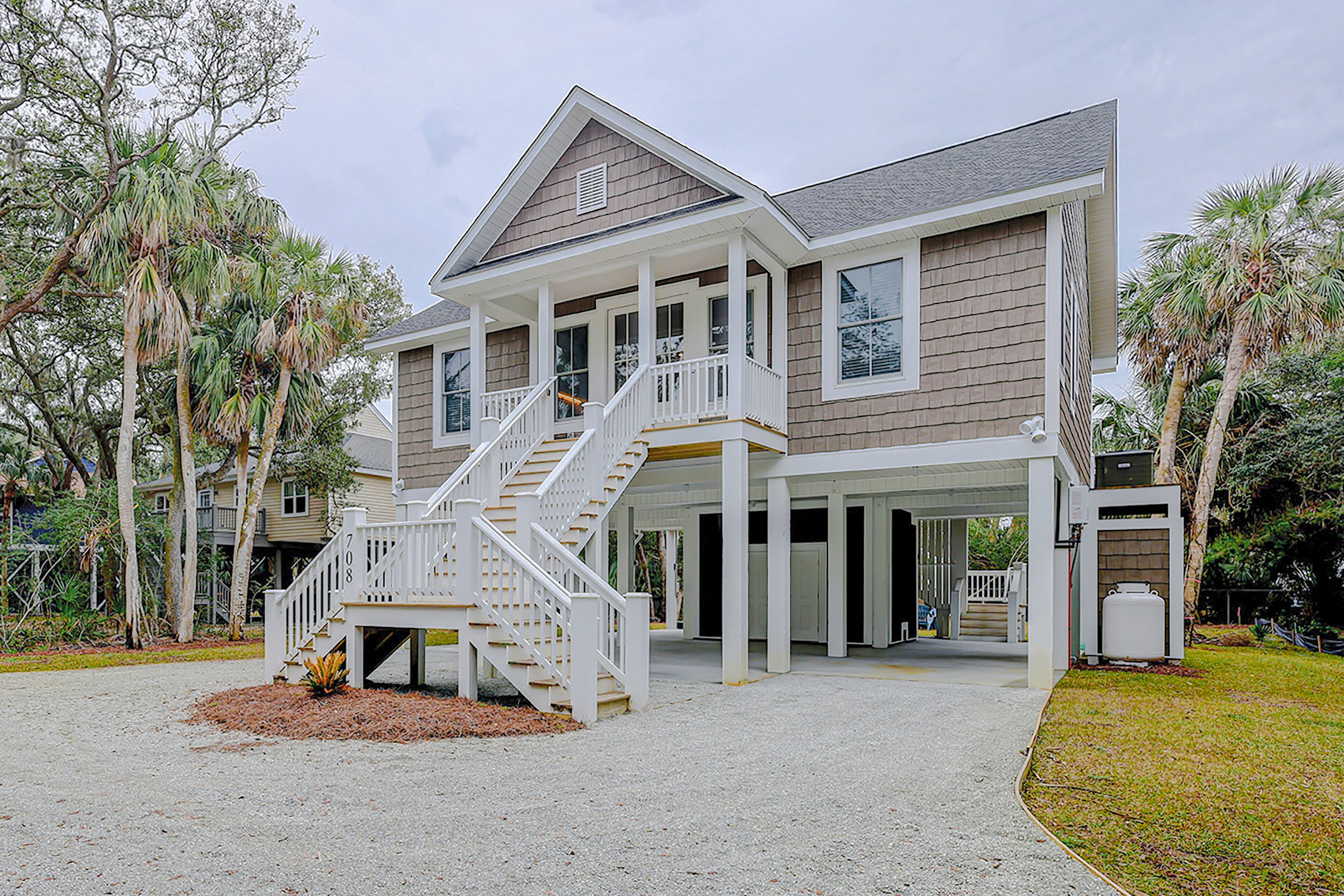Elegant coastal home with beach access, firepit, & washer/dryer