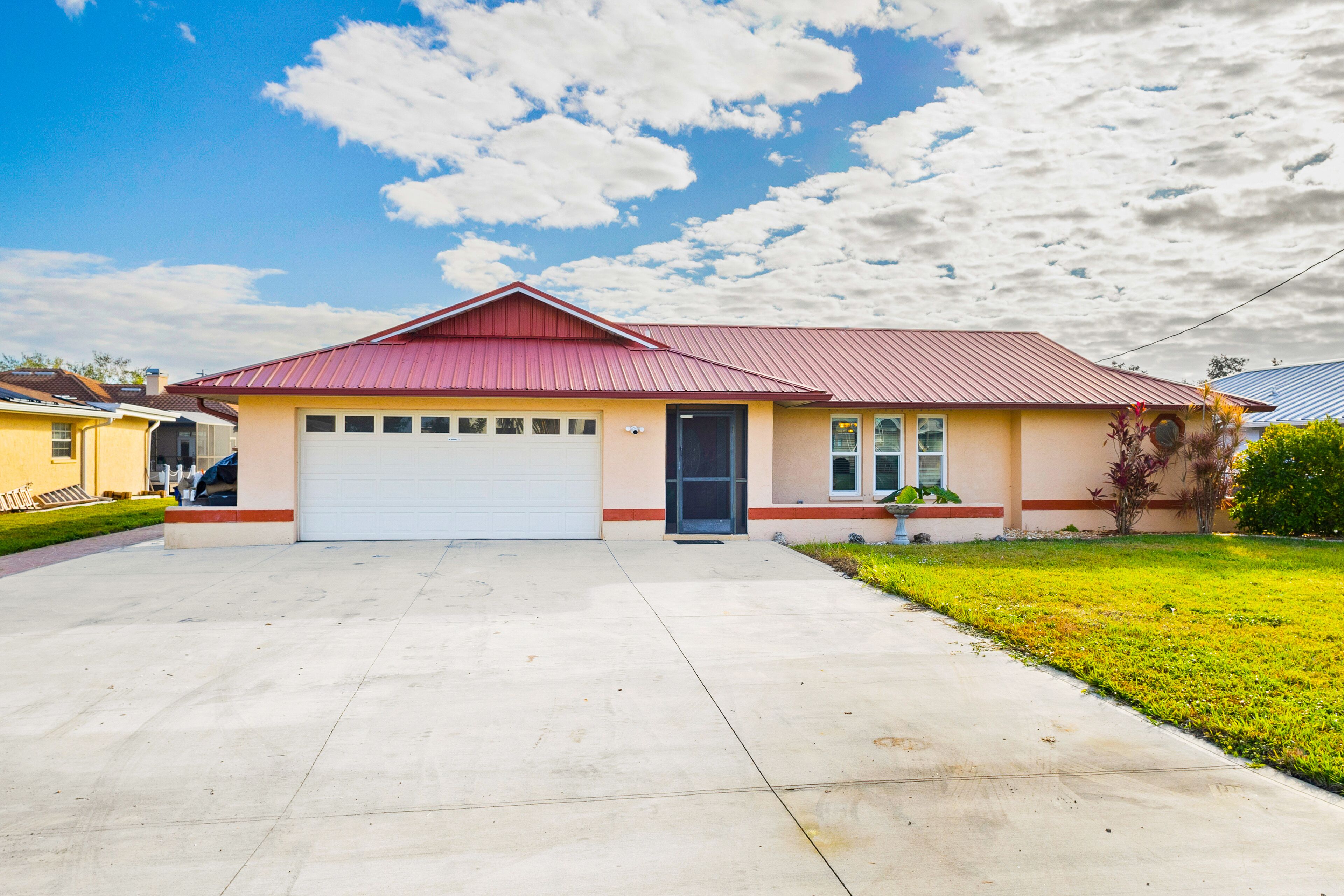 Waterfront home on a canal with saltwater pool, great patio, views & AC