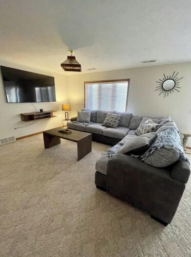 Family size home close to hospitals and schools. 2 Car garage & deck